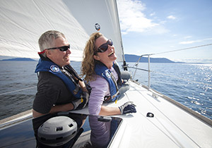 Couple on sailboat bow